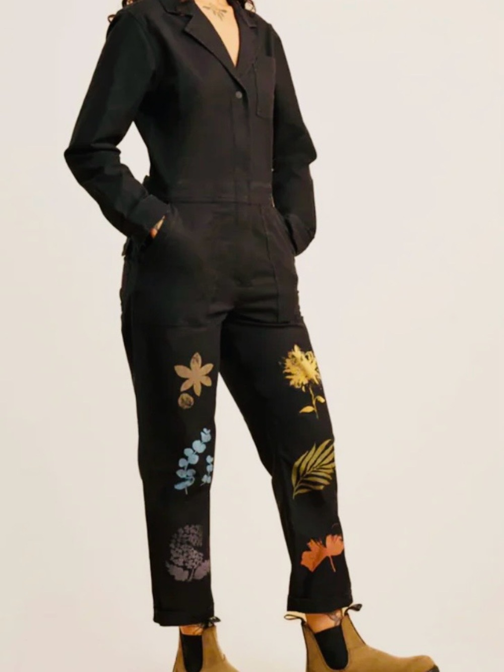 Roark Black Layover Jumpsuit with Multicolor Floral Prints.
